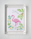 Colony Hotel flamingo painting displayed in a clear acrylic block frame